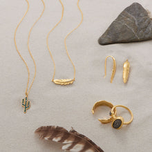 Load image into Gallery viewer, 18 Karat Gold Plated Sideways CZ Feather Necklace
